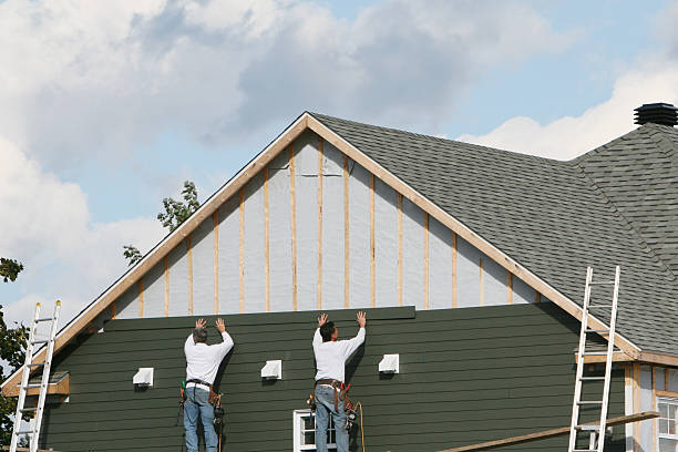 Professional Emergency Siding Repair technician working in Loyalhanna, PA